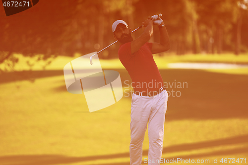 Image of golf player hitting long shot