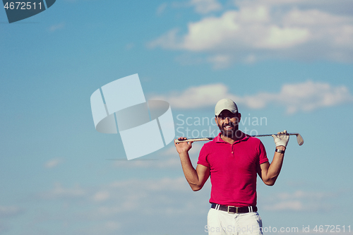 Image of handsome middle eastern golf player portrait at course