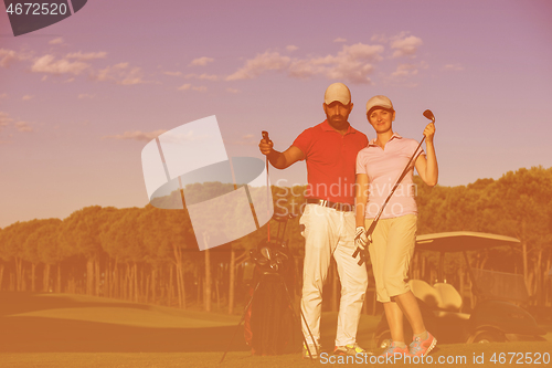 Image of portrait of couple on golf course