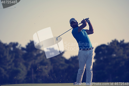 Image of golfer hitting long shot