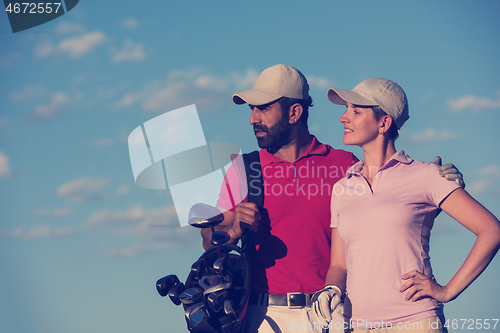 Image of portrait of couple on golf course