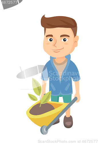 Image of Boy pushing wheelbarrow with soil and plant.