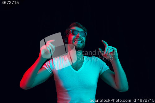 Image of Enjoying his favorite music.