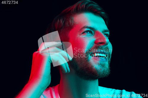 Image of Enjoying his favorite music.