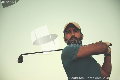 Image of golfer hitting long shot