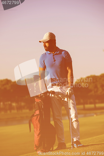 Image of golfer  portrait at golf  course