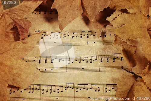 Image of old music and leaves