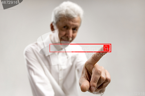 Image of Businessman hand touching empty virtual screen