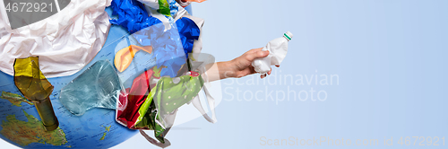 Image of A globe of the earth with trash over white background, the concept of ecology problem