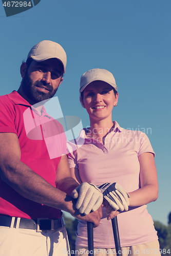 Image of portrait of couple on golf course