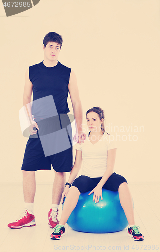 Image of happy young couple fitness workout and fun