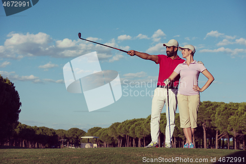 Image of portrait of couple on golf course