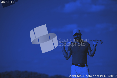 Image of handsome middle eastern golf player portrait at course