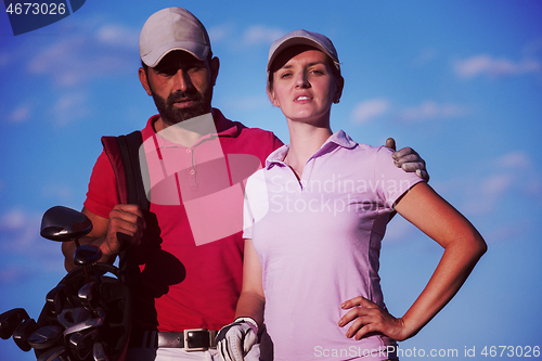 Image of portrait of couple on golf course