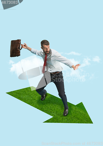 Image of Businessman holding briefcase walking on graphic stair, start up business concepts.