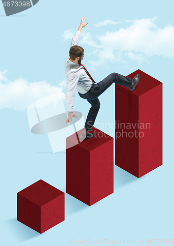 Image of Businessman walking on graphic stair, start up business concepts.