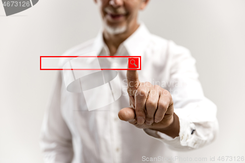 Image of Businessman hand touching empty virtual screen