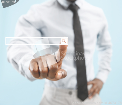 Image of Businessman hand touching empty virtual screen