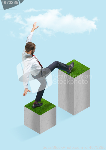 Image of Businessman holding briefcase walking on graphic stair, start up business concepts.