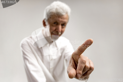 Image of Businessman hand touching empty virtual screen