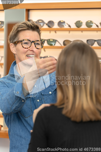 Image of woman in a eyewear store