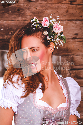 Image of Portrait of a young woman in a dirndl