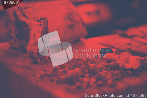 Image of Juicy slice of raw steak on wooden table