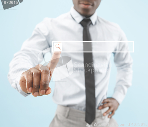 Image of Businessman hand touching empty virtual screen