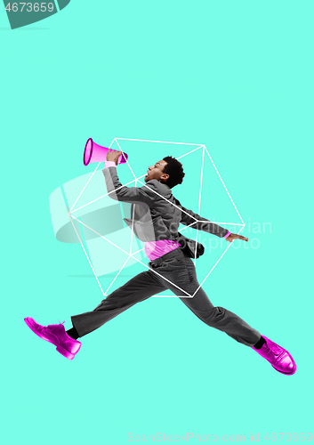 Image of Business man screaming with a megaphone