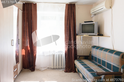 Image of Interior of a budget room in an old hotel