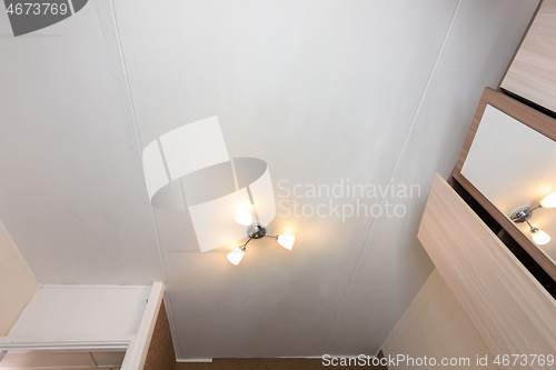 Image of Old plaster whitewashed ceiling in the apartment