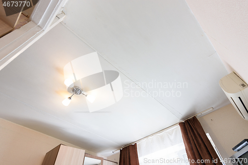 Image of View of the old plastered ceiling in an apartment in need of repair