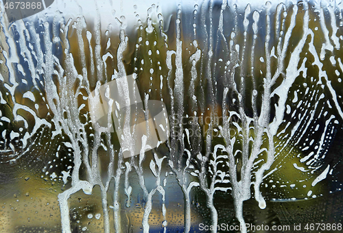 Image of Natural texture with soap foam abstract pattern on glass