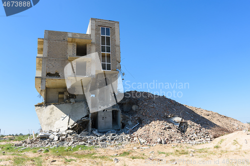 Image of Demolition of an illegally built house in the riverside