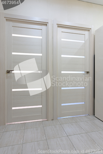 Image of Two interior doors in the apartment close up