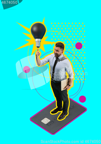 Image of Concept of a new idea. A man going with a lamp