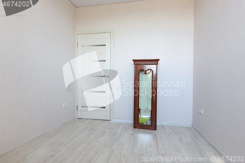 Image of The interior of an empty room prepared for moving to another apartment