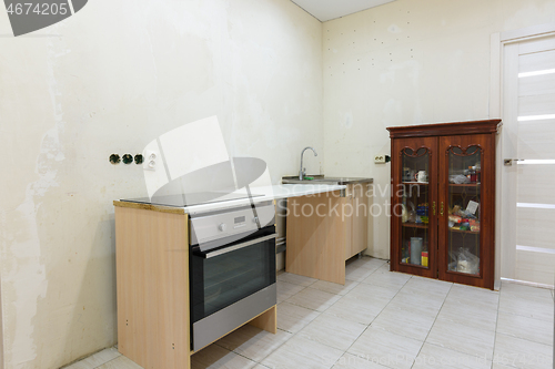 Image of The interior of a budget temporary kitchen, assembled during the renovation of the apartment