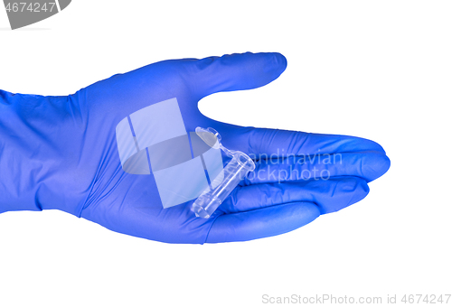Image of Test tube in hand in gloves isolated on white