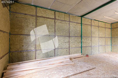 Image of Wall of a country house with mineral thermal insulation from the inside