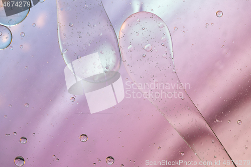 Image of Defocused pastel colored abstract background picture made with oil, water and soap