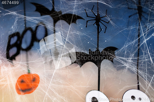 Image of halloween party decorations and spiderweb