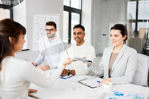 Image of recruiters having job interview with employee