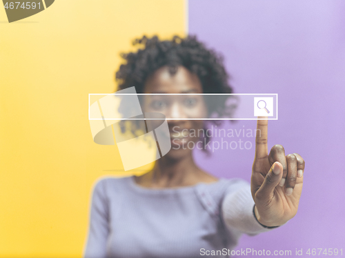 Image of Woman\'s hand with finger on blue background