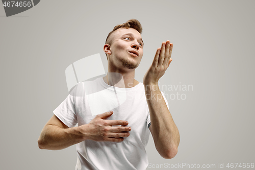 Image of I kiss you. Portrait of attractive man with kiss on lips