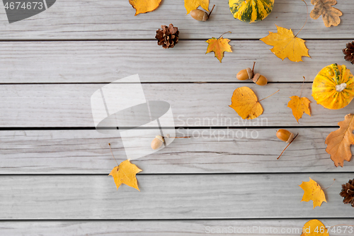 Image of autumn leaves, chestnuts, acorns and pumpkins