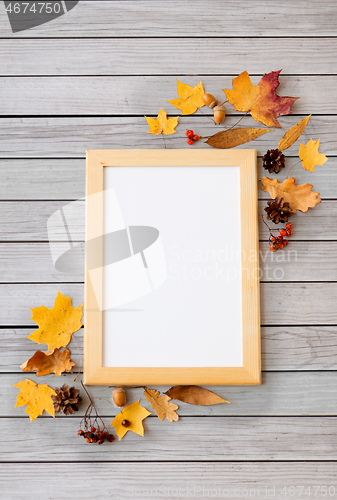 Image of autumn fruits and picture frame or whiteboard