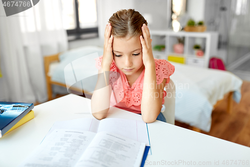 Image of sad student girl with notebook at home