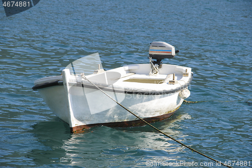 Image of Small sea boat achored in the bay