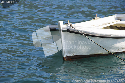 Image of Small sea boat achored in the bay